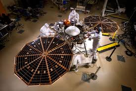 The Insight lander with solar panels deployed in a cleanroom (Robotics)